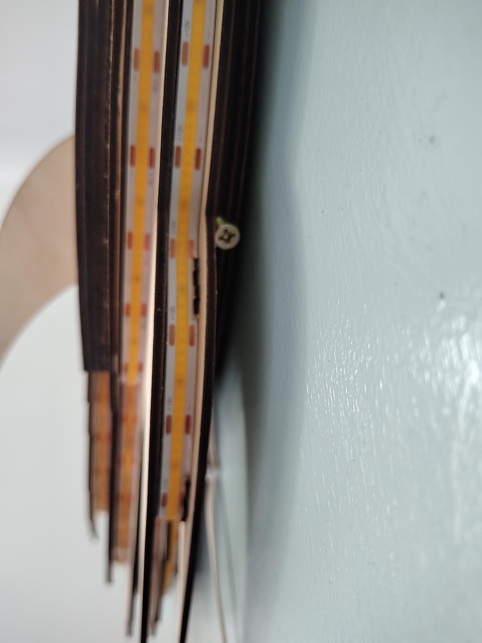 Close-up of one of the hidden retaining screws.